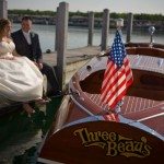 wooden boat bride groom photo northern michigan picture