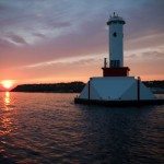 mackinac island lighthouse sunset photo from ferry picture