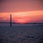 mackinac bridge sun setting northern michigan photo