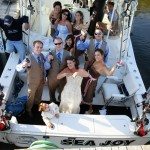 wedding party fishing boat frankfort michigan photo