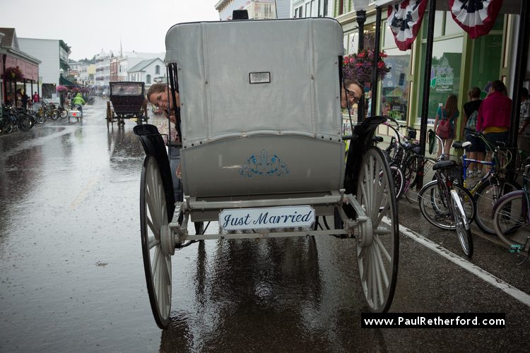 photo carriage mackinac island wedding rain