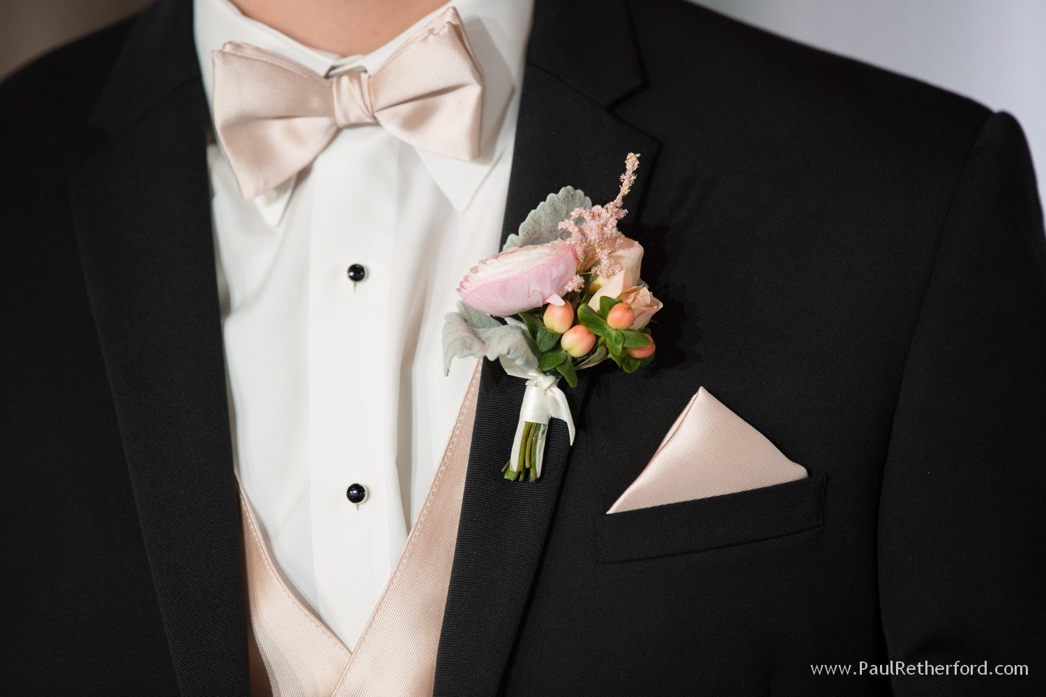 groom boutinerre wedding photo