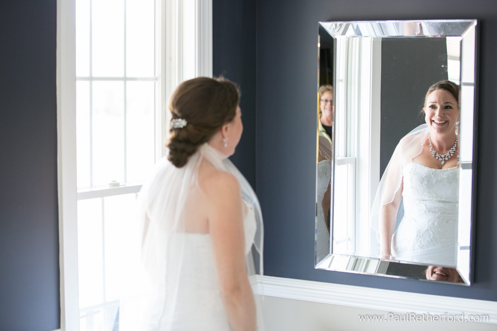 bride in mirror wedding photo