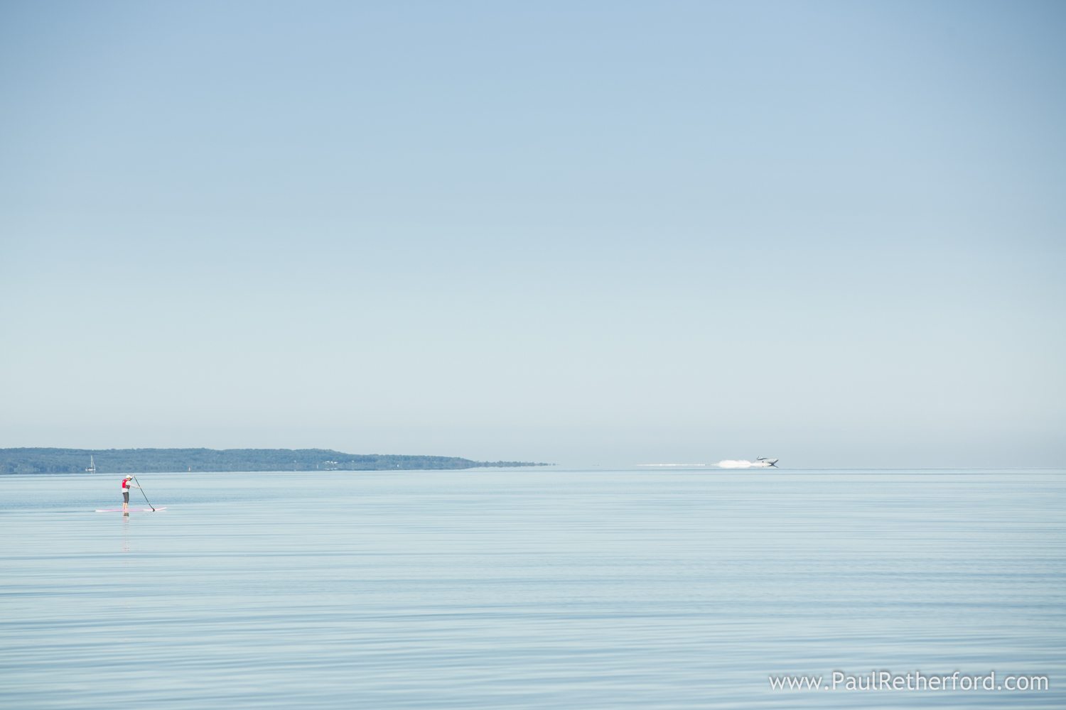 paddleboard on lake michigan photo