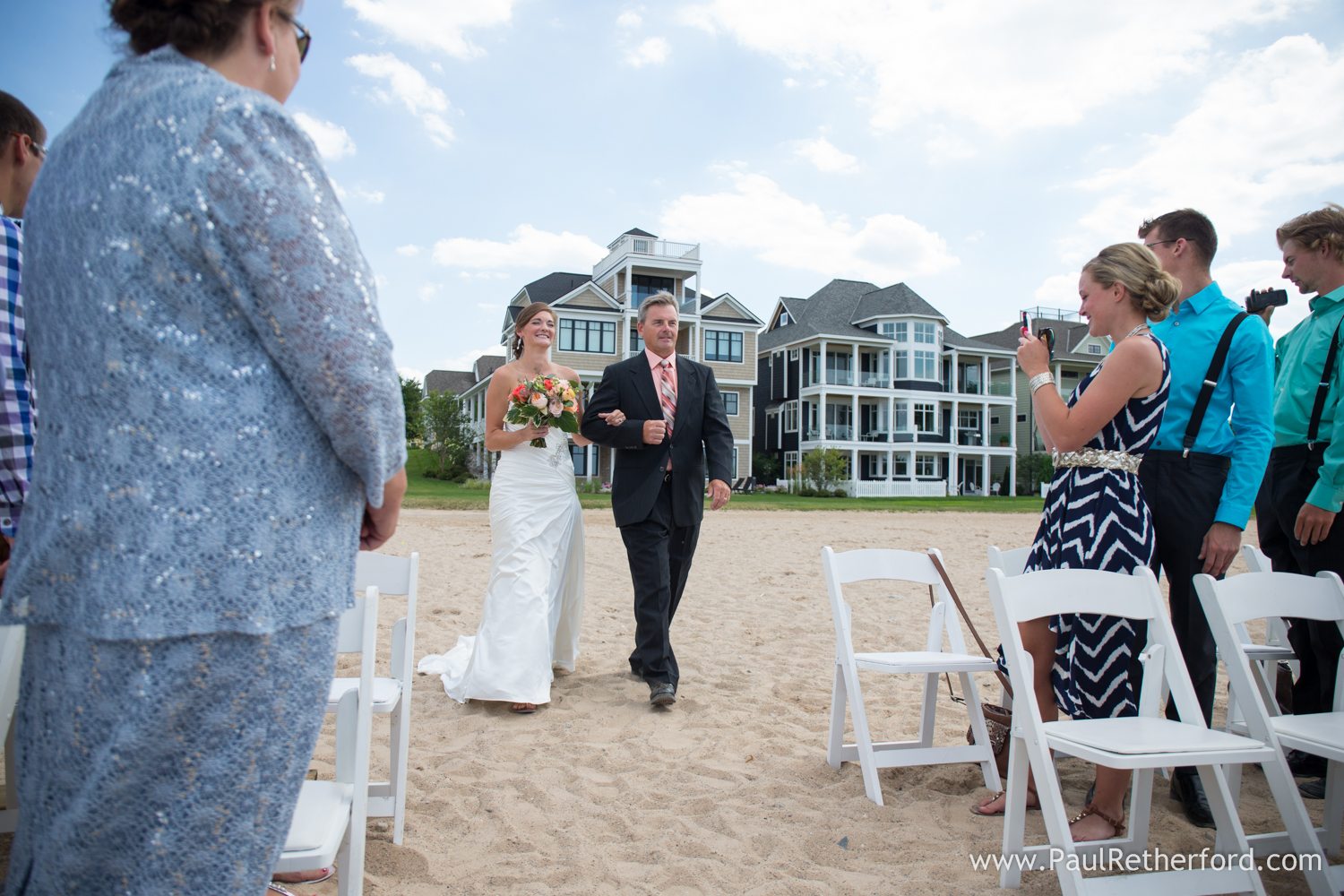 bride in beach aisle bay harbor photo