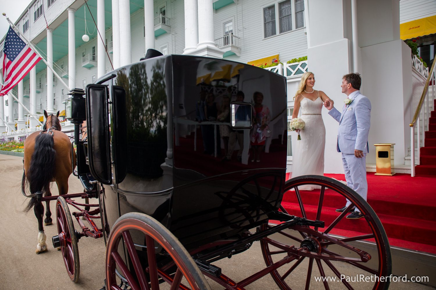 grand hotel red stairs wedding photo