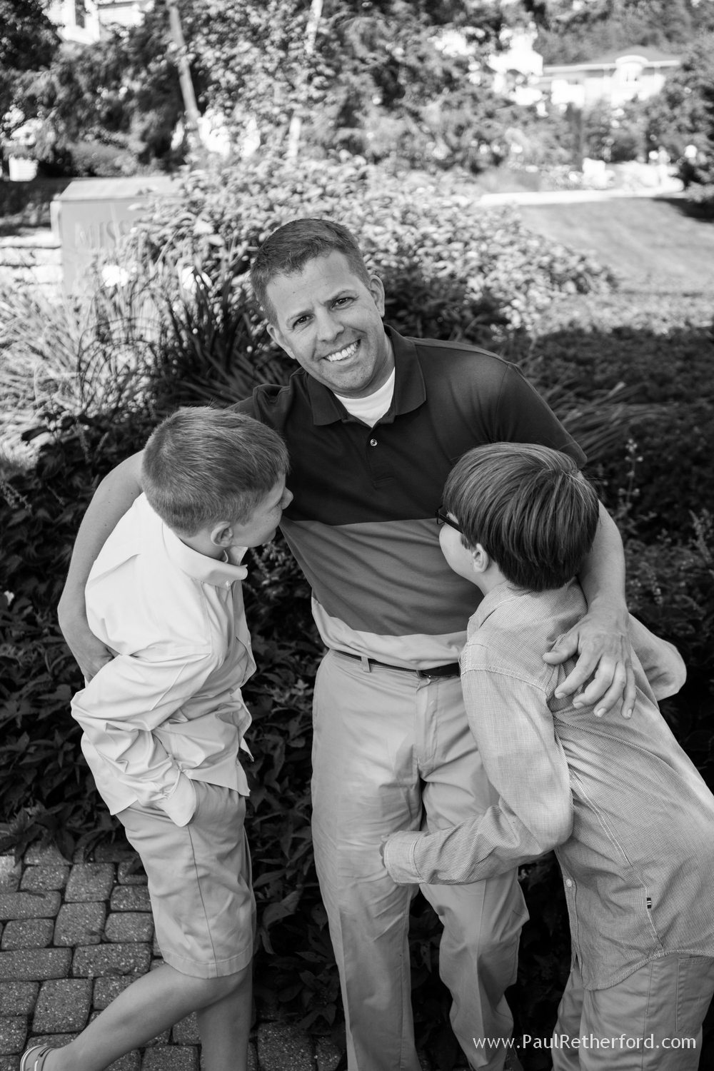 father kids fun family photo