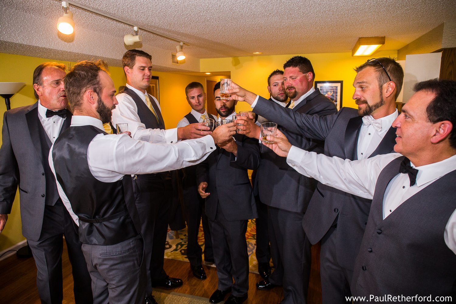 groom drinks before the wedding cheers
