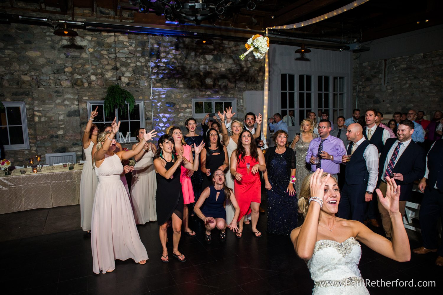 bouquet toss castle farms wedding photo
