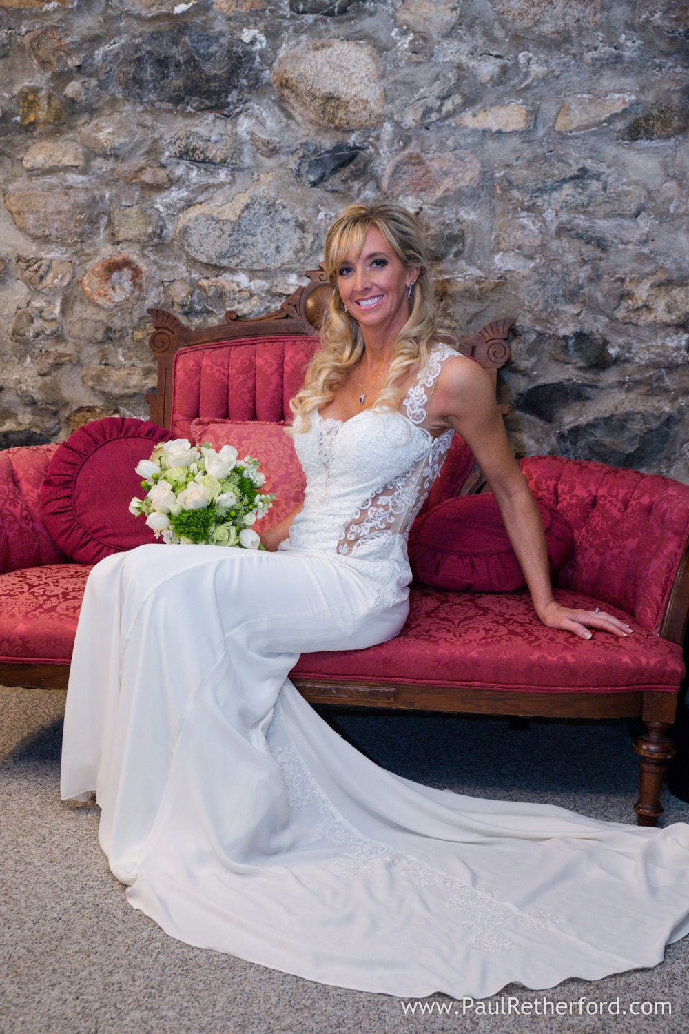 bride on couch wedding photo