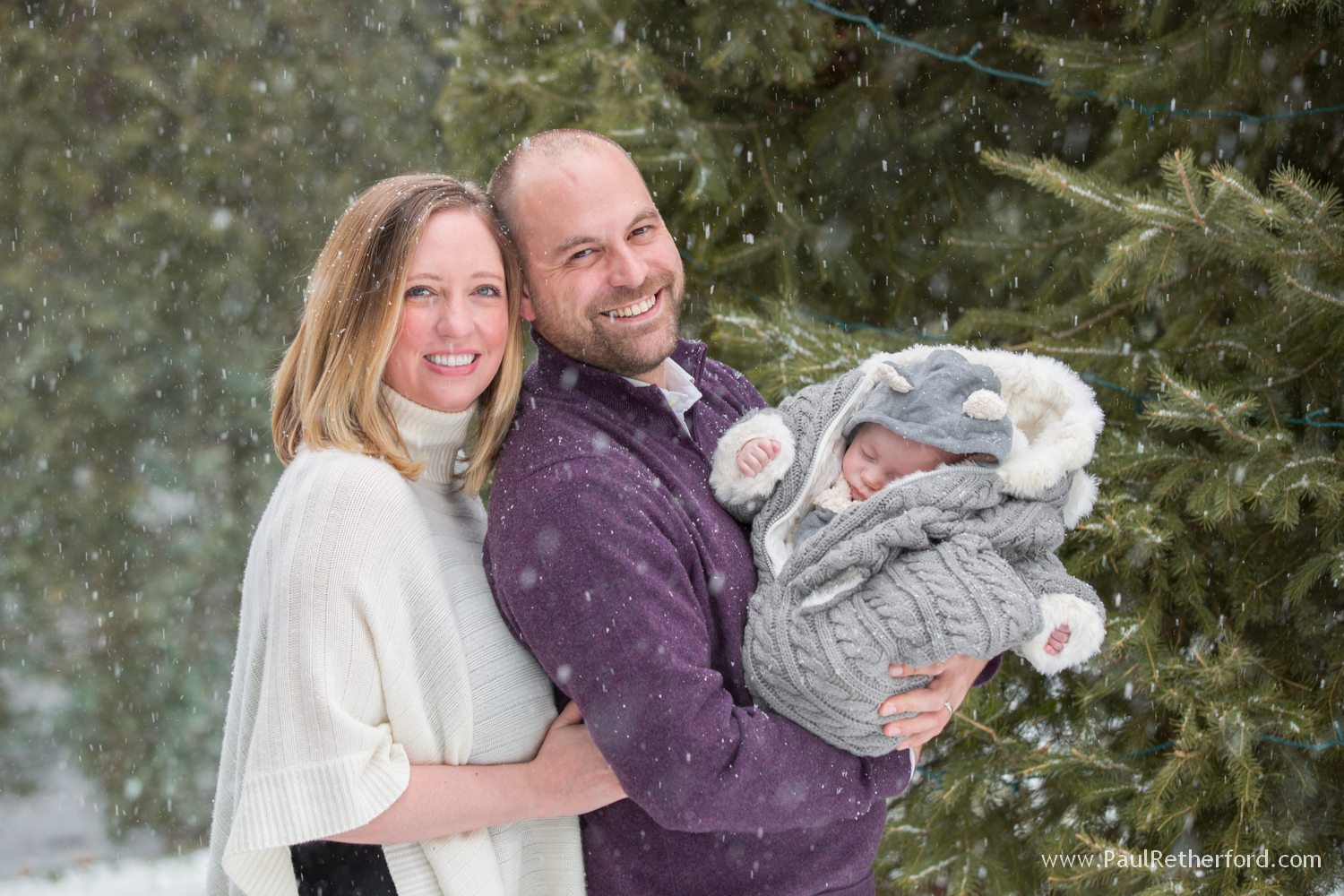 snow falling family photo