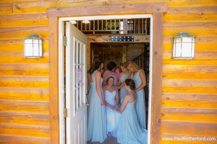 praying with bride photo