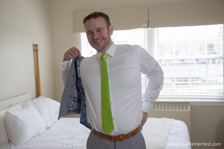 groom preparing for wedding mackinac island