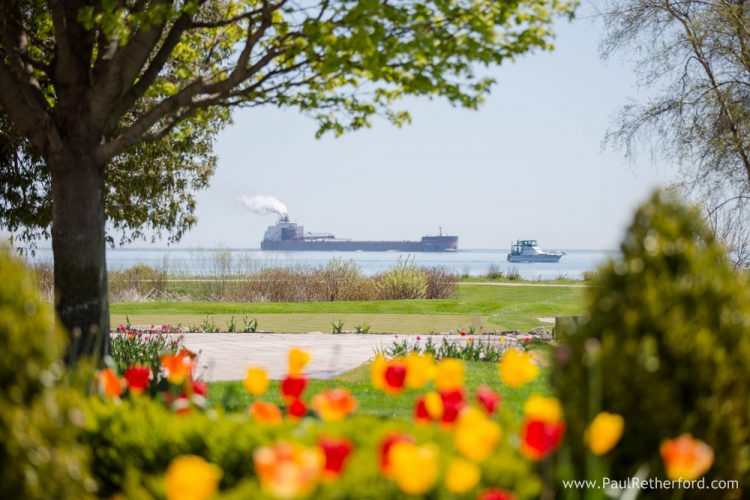 freighters going by mackinac island photo