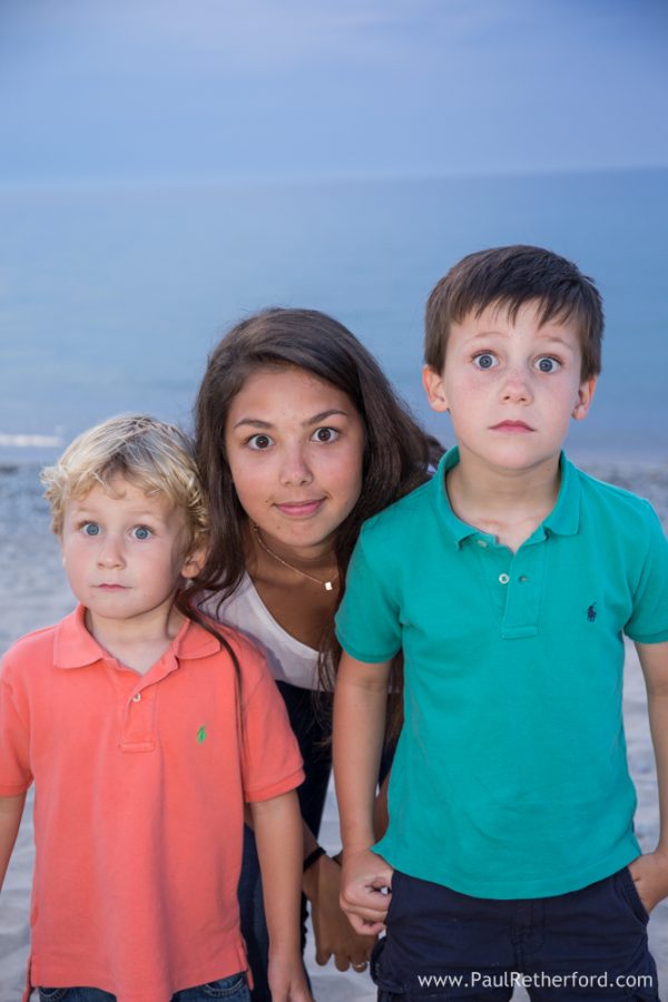 kid funny face family photo