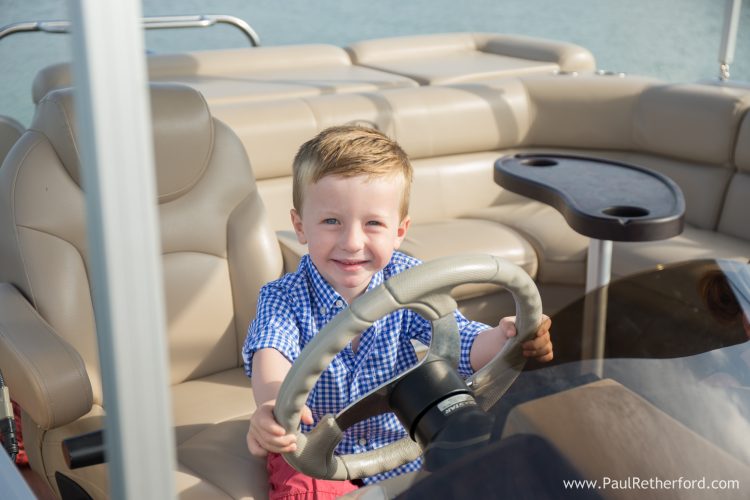 kid pontoon boat boy photo