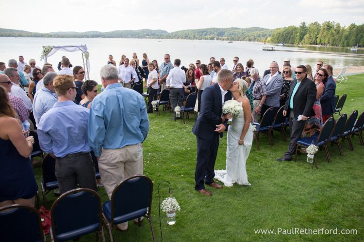 kiss wedding aisle photo