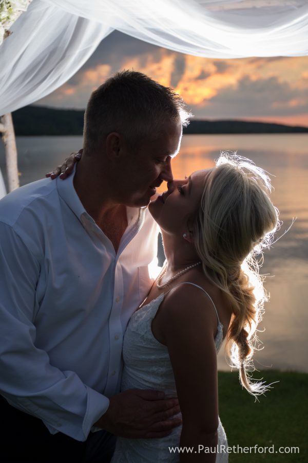 Boyne Mountain Beach House Wedding Photography Deer Lake backlit wedding photo boyne mountain