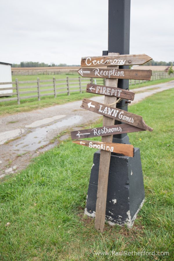rustic barn wedding sign post photo