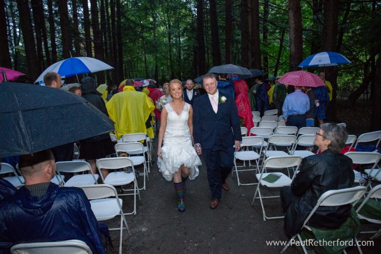 forest rainy wedding aisle bride groom photo