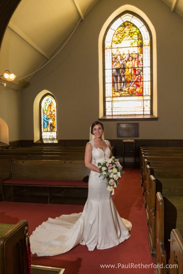 little stone church wedding photo