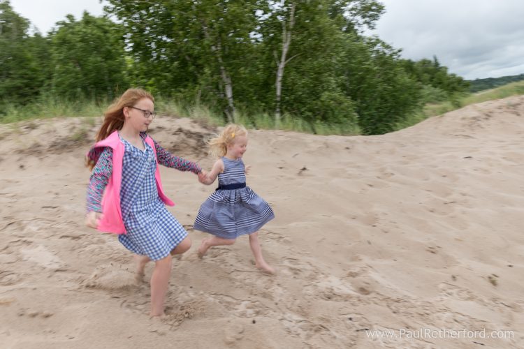 running down dunes charlevoix michigan photo