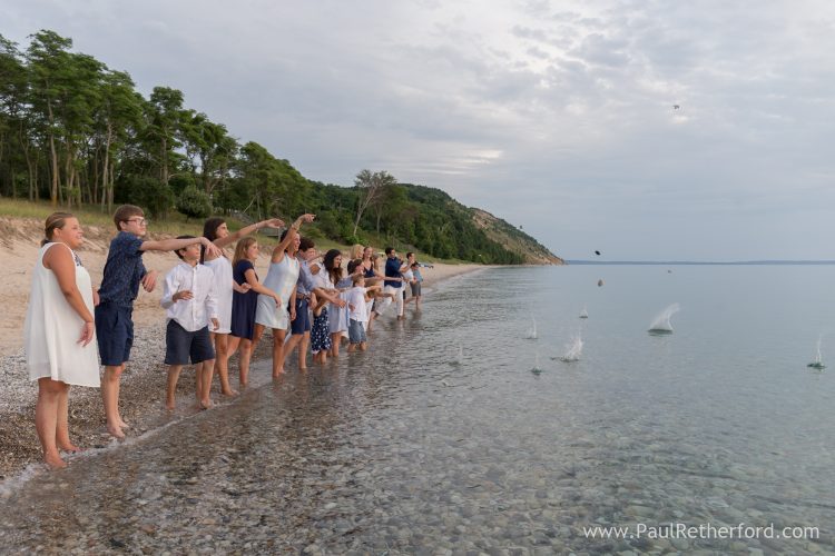 throwing rocks in lake michigan photo